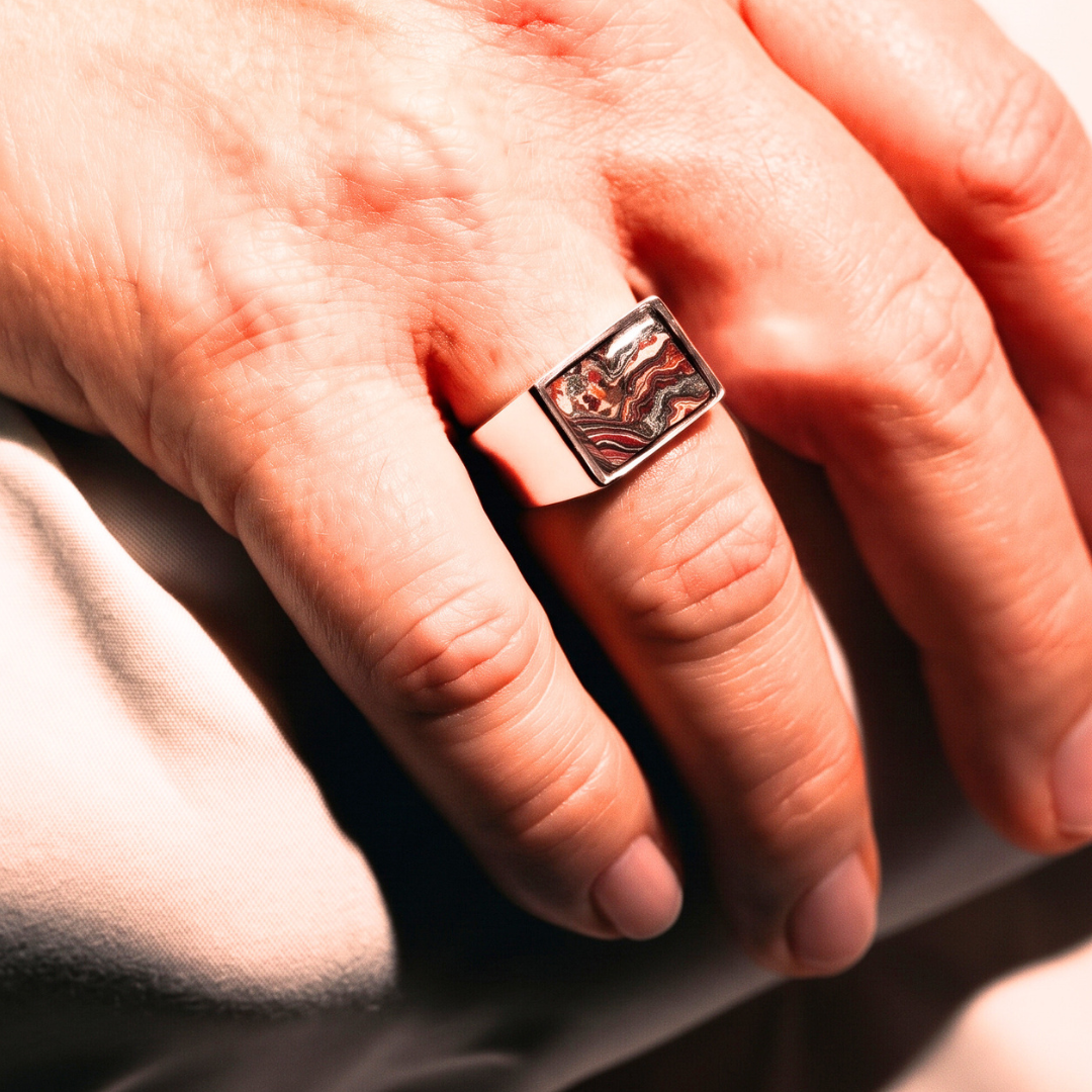 Rebel Nell Corvette Kim Ring made with reclaimed Bowling Green factory paint, worn on the hand