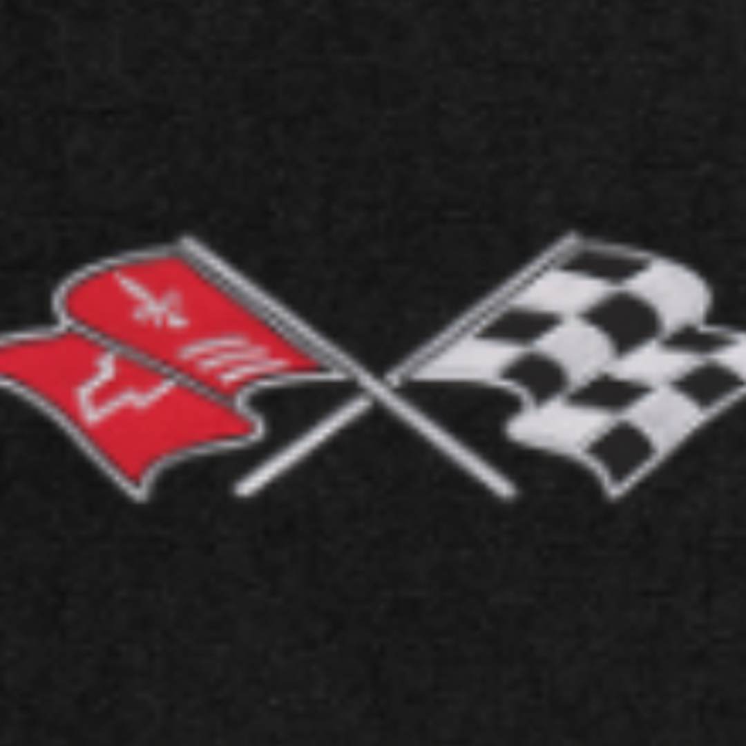 C3 Corvette Crossed Flags logo on black Lloyd carpet - close-up