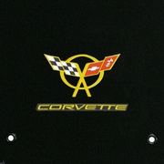 C5 Corvette Crossed Flags and Corvette script logo in yellow - close-up
