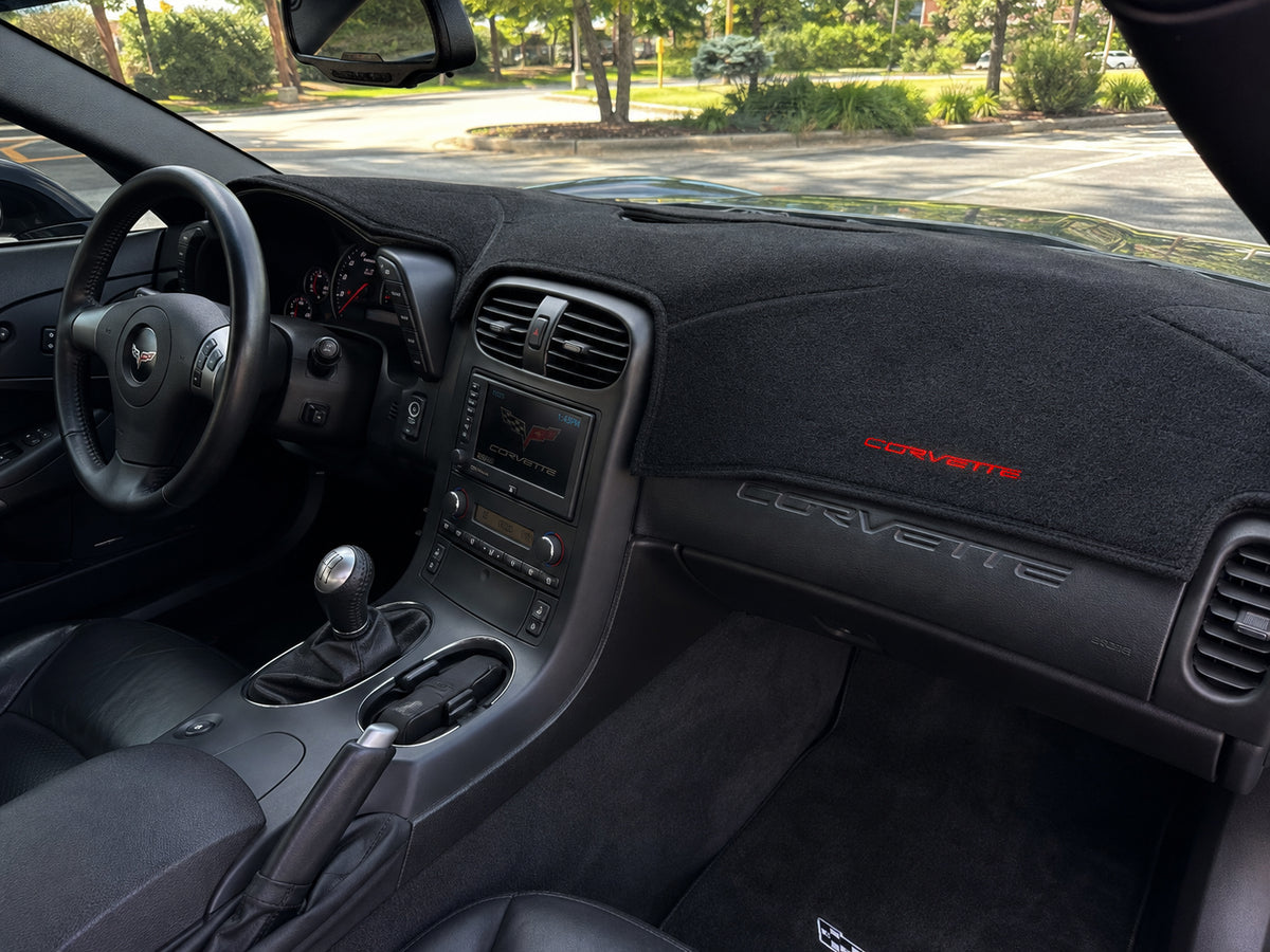 C6 Corvette Coverking custom dash cover with embroidered red Corvette lettering