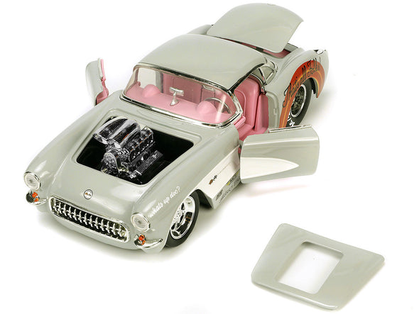 1957-chevrolet-corvette-beige-with-pink-interior-with-bugs-bunny-figure-looney-tunes-hollywood-rides-series-1-24-diecast-model-car-by-jada