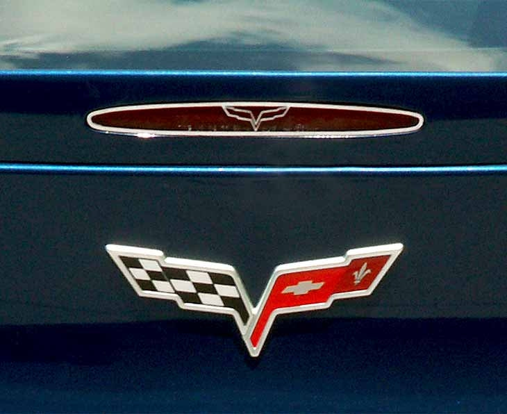 C6 Corvette 5th Brake Light Trim Crossed Flags Style | Polished Stainless Steel